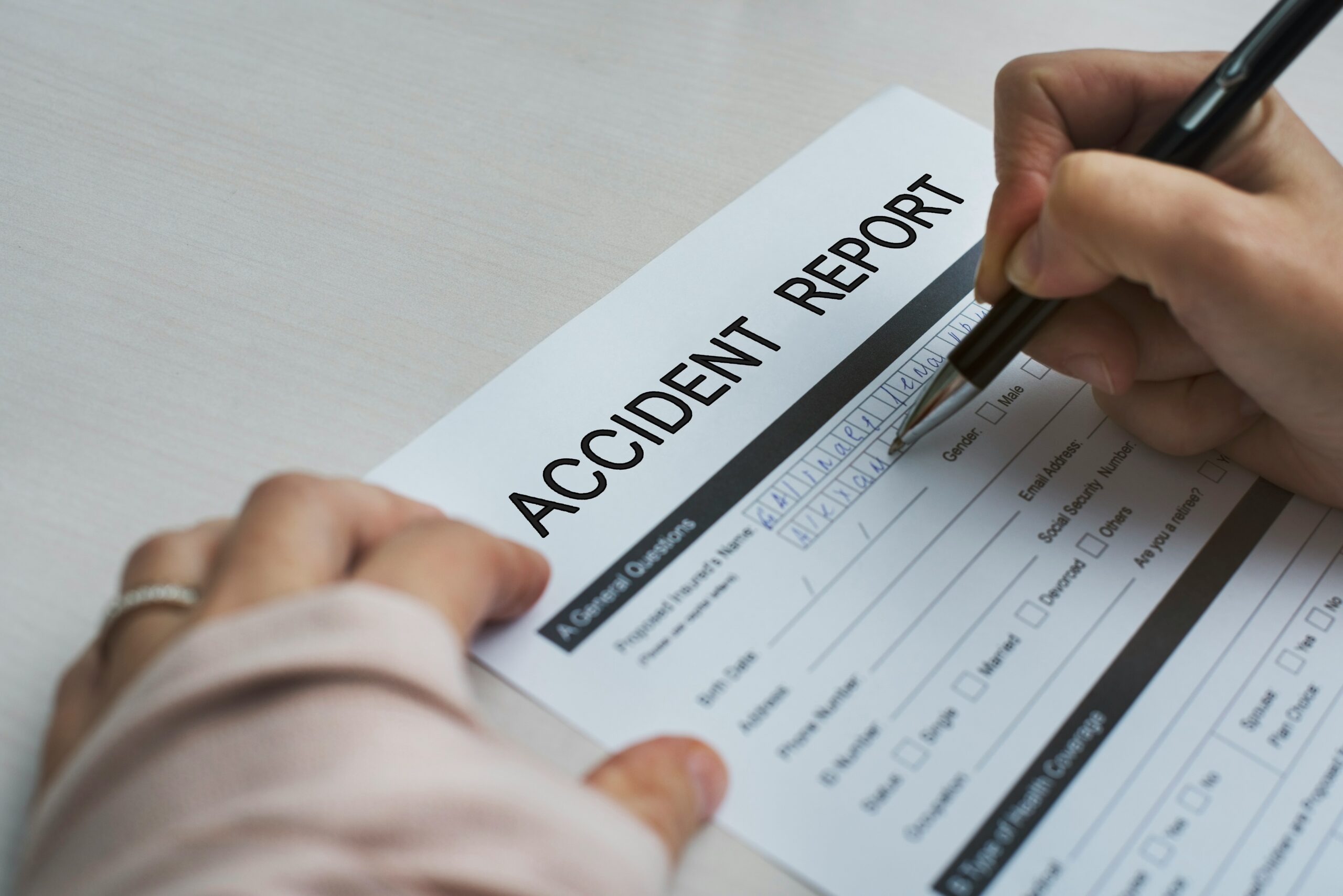 traffic accident report being completed by officer